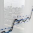 City skyline reflected on a graph