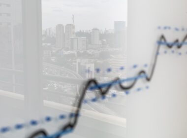 City skyline reflected on a graph