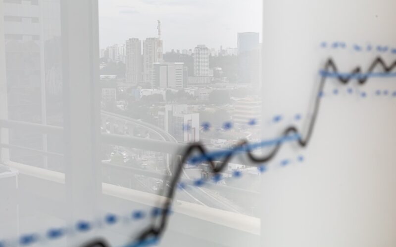City skyline reflected on a graph