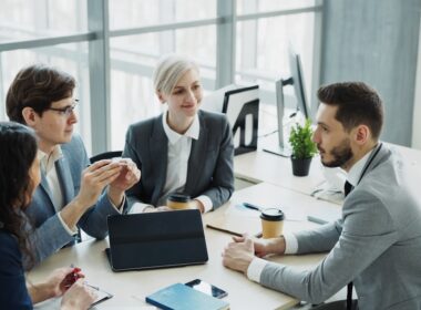Diverse business team collaborating in a modern office.