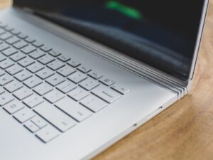 white and black laptop computer