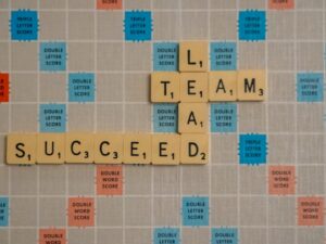 scrabbled scrabble tiles with words on them